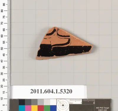 Terracotta fragment of a kylix (drinking cup)