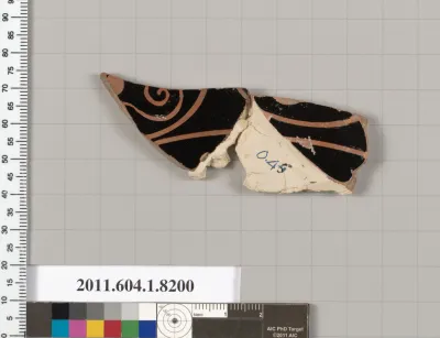 Terracotta fragment of a kylix (drinking cup)