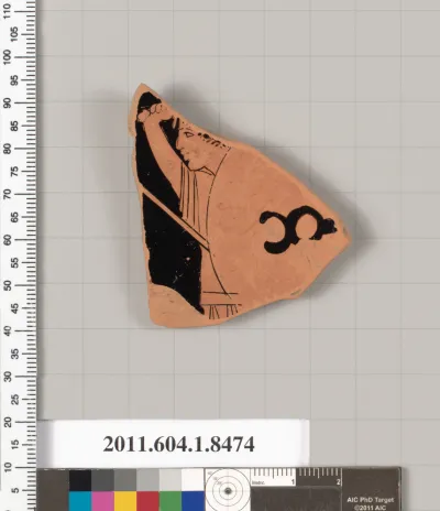 Terracotta fragment of a stemless kylix (drinking cup)
