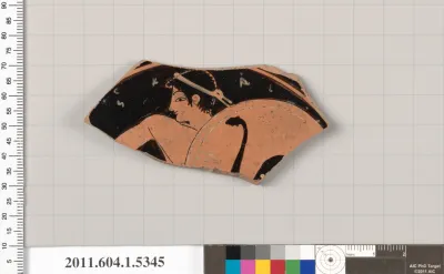 Terracotta fragment of a kylix (drinking cup)