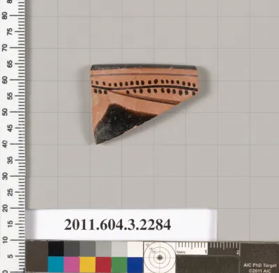 Terracotta rim fragment of a kylix: eye-cup (drinking cup)