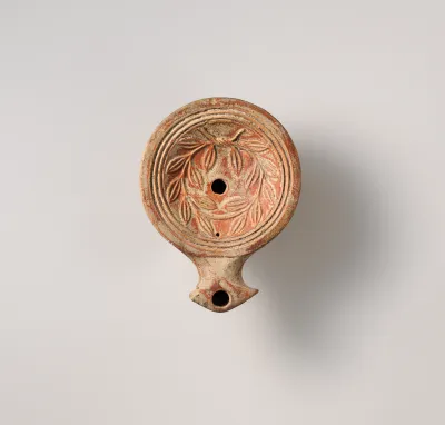 Terracotta oil lamp