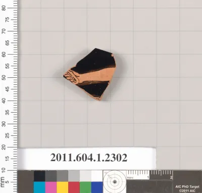 Terracotta fragment of a kylix (drinking cup)