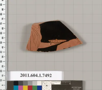 Terracotta fragment of a kylix (drinking cup)