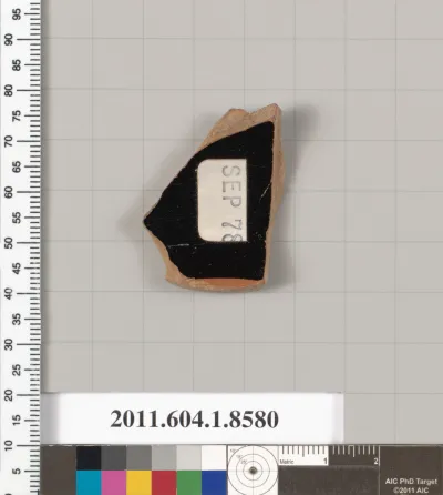 Terracotta fragment of a stemless kylix (drinking cup)