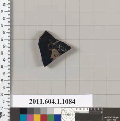 Terracotta fragment of a kylix (drinking cup)