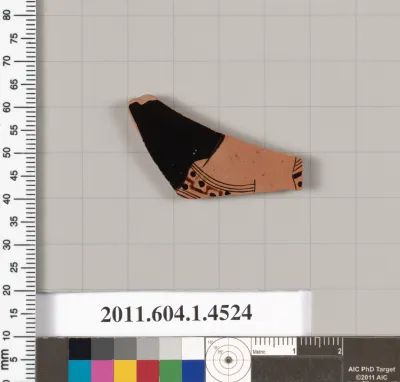 Terracotta fragment of a kylix (drinking cup)