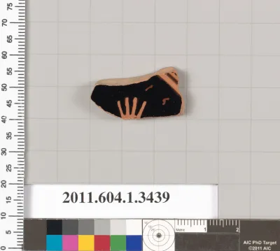 Terracotta fragment of a kylix (drinking cup)