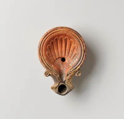 Terracotta oil lamp
