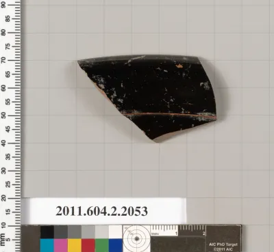 Terracotta fragment of a lid?