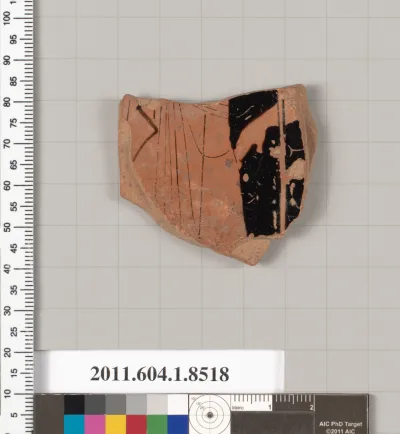 Terracotta fragment of a stemless kylix (drinking cup)