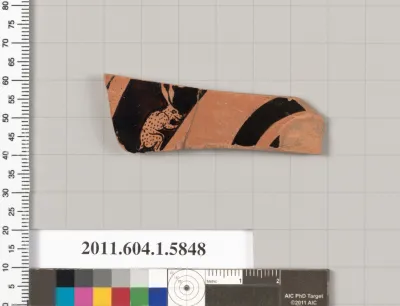 Terracotta fragment of a kylix: eye-cup  (drinking cup)