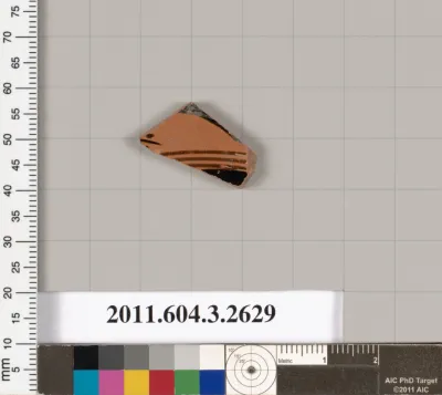 Terracotta fragment of a kylix: eye-cup (drinking cup)