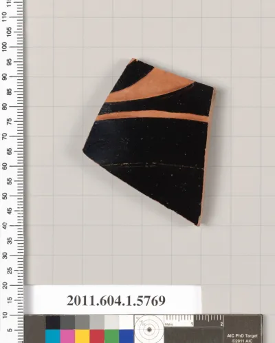 Terracotta fragment of a kylix: eye-cup  (drinking cup)