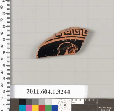 Terracotta fragment of a kylix (drinking cup)