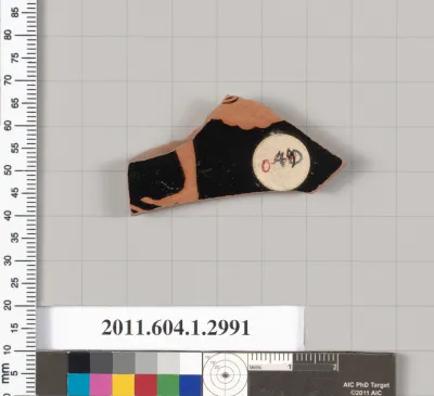 Terracotta fragment of a kylix (drinking cup)