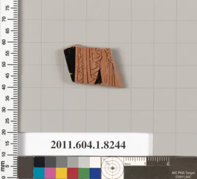 Terracotta fragment of a kylix (drinking cup)