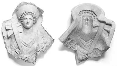 Mold of a Torso and Head of a Draped Female Figure