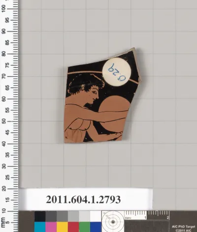 Terracotta fragment of a kylix (drinking cup)