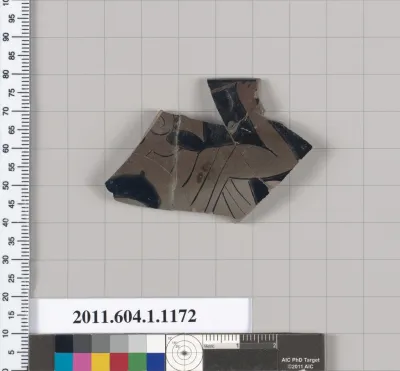 Terracotta fragment of a kylix (drinking cup)