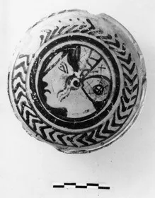 PYXIS LID, FRAGMENT (ATHENIAN, RED-FIGURE)