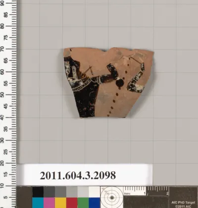 Terracotta fragment of a kylix (drinking cup)