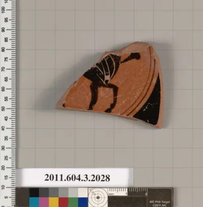 Terracotta fragment of a kylix (drinking cup)