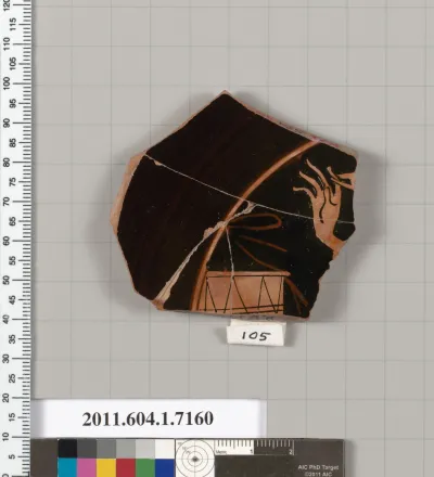 Terracotta fragment of a kylix (drinking cup)