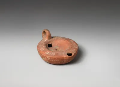 Terracotta oil lamp