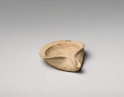 Terracotta saucer-shaped lamp