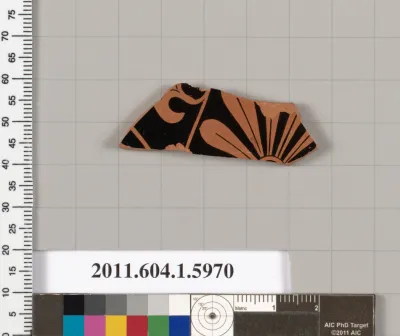 Terracotta fragment of a kylix (drinking cup)