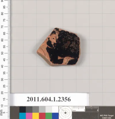 Terracotta fragment of a kylix (drinking cup)