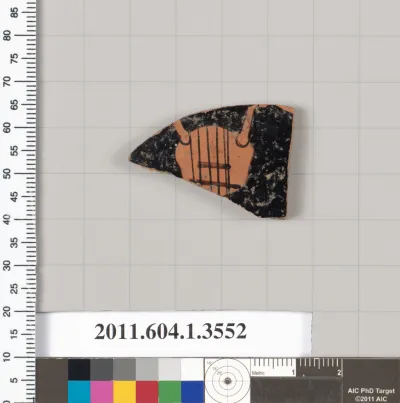 Terracotta fragment of a kylix (drinking cup)