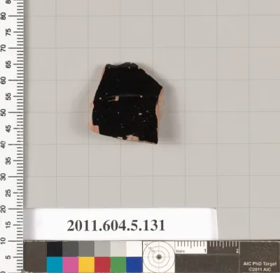 Terracotta fragment of a stemless kylix (drinking cup)?