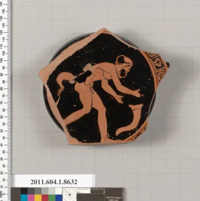 Terracotta fragment of a stemless kylix (drinking cup)