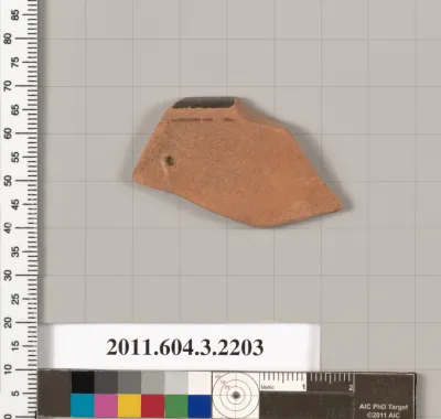 Terracotta rim fragment of a kylix (drinking cup)