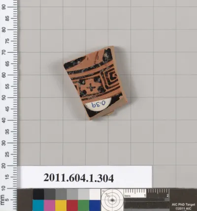 Terracotta fragment of a kylix (drinking cup)