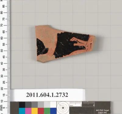 Terracotta fragment of a kylix (drinking cup)