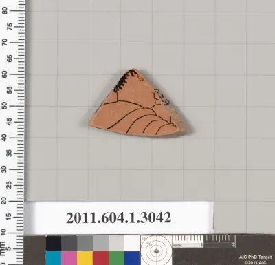 Terracotta fragment of a kylix (drinking cup)