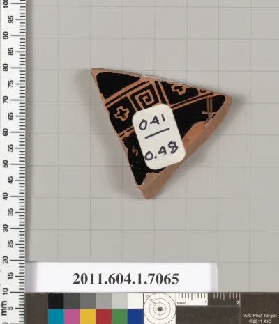 Terracotta fragment of a kylix (drinking cup)