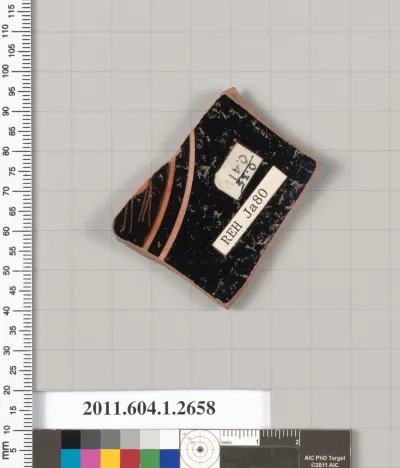 Terracotta fragment of a kylix (drinking cup)