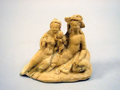 Terracotta group of a reclining youth, woman, and child