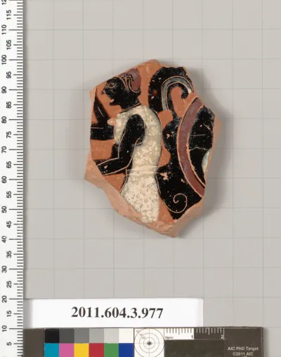 Terracotta fragment of a lekanis lid (covered dish)