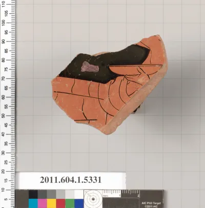 Terracotta fragment of a kylix (drinking cup)