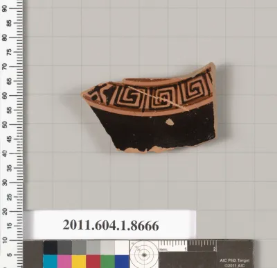 Terracotta fragment of a stemless kylix (drinking cup)