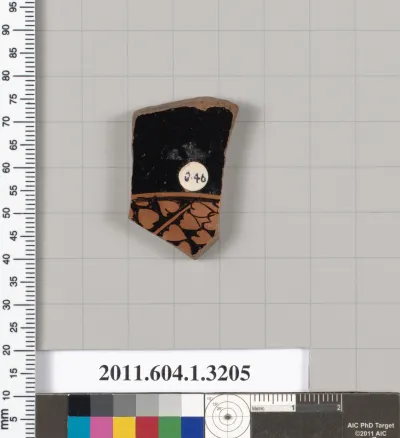 Terracotta fragment of a kylix (drinking cup)