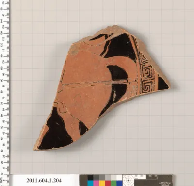 Terracotta fragment of a kylix (drinking cup)