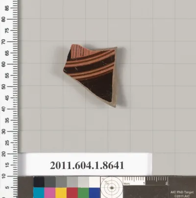 Terracotta fragment of a stemless kylix (drinking cup)