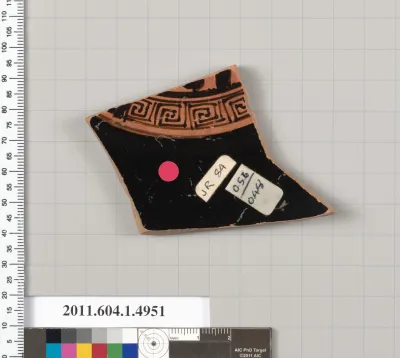 Terracotta fragment of a kylix (drinking cup)