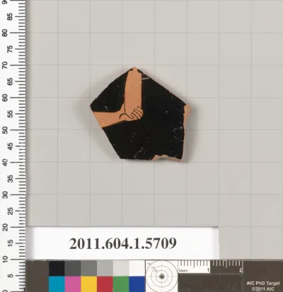 Terracotta fragment of a kylix (drinking cup)